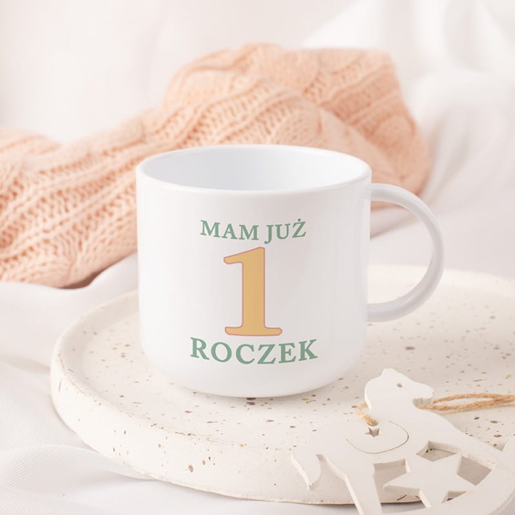 Miękki ręcznik dziecięcy z motywem dinozaura i kolorowymi balonami, idealny na pierwsze urodziny.
