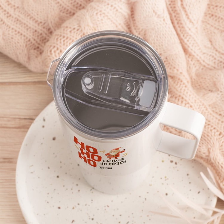 bialy kubek z grafika mikolaja