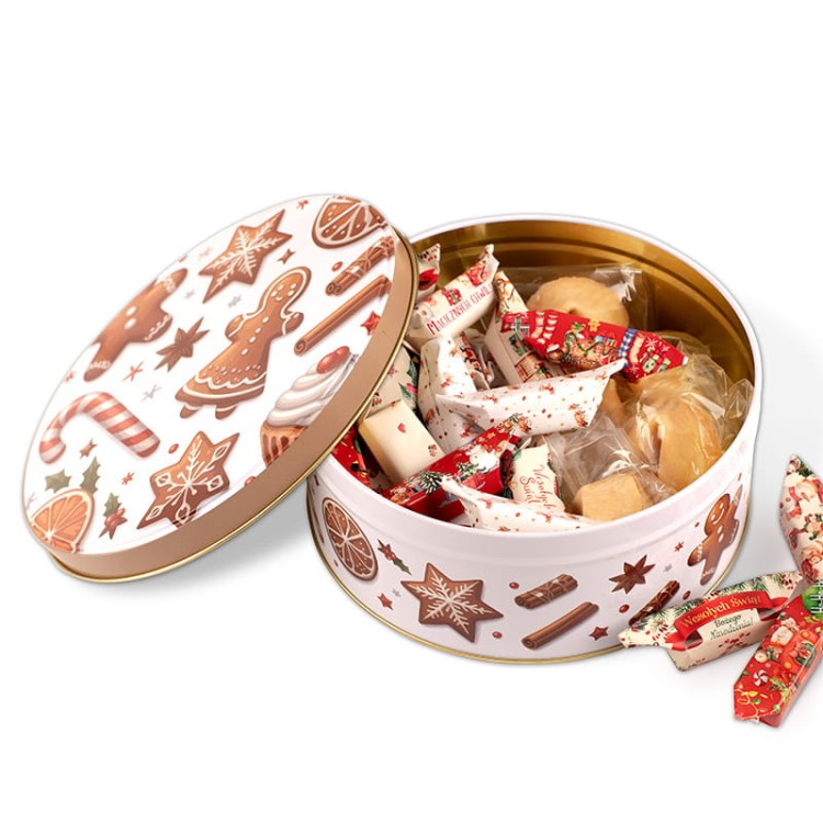 Zestaw słodyczy w metalowej puszce na Boże Narodzenie, idealny na prezent dla miłośnika słodyczy.