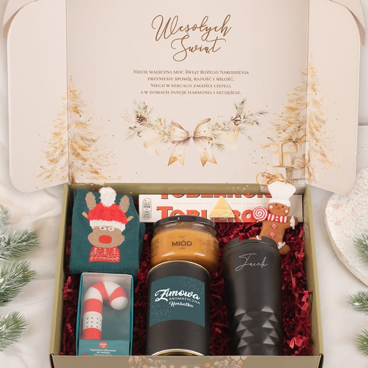 Zestaw świąteczny z kubkiem termicznym, miodem, herbatą i czekoladą w eleganckim opakowaniu.