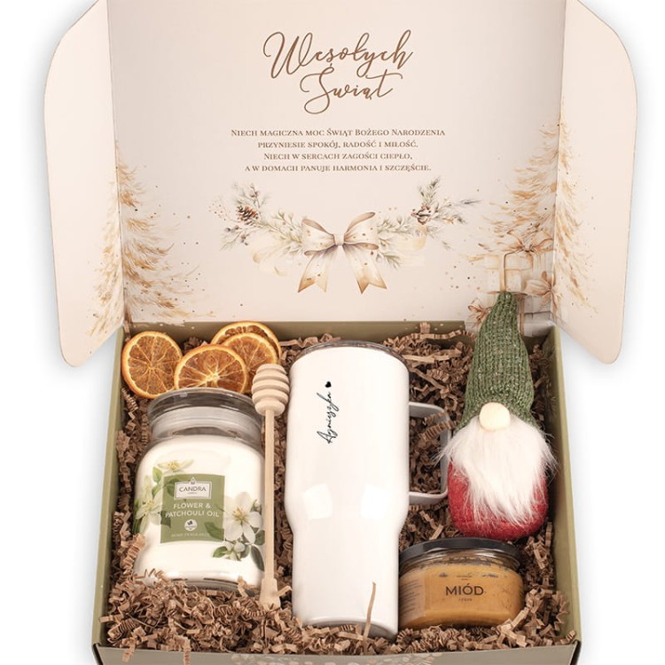 Stylowy zestaw świąteczny z ciepłą świecą i dodatkami relaksującymi.