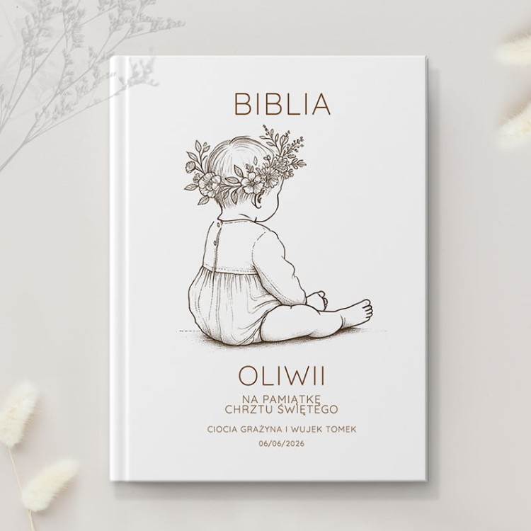 Personalizowana Biblia na Chrzest Święty z imieniem dziewczynki i datą.