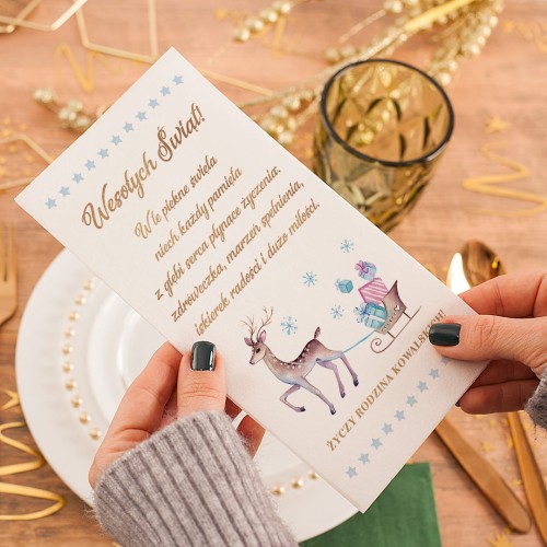 Opłatek świąteczny z reniferem, nadrukiem życzeń i podpisem rodzinnym.