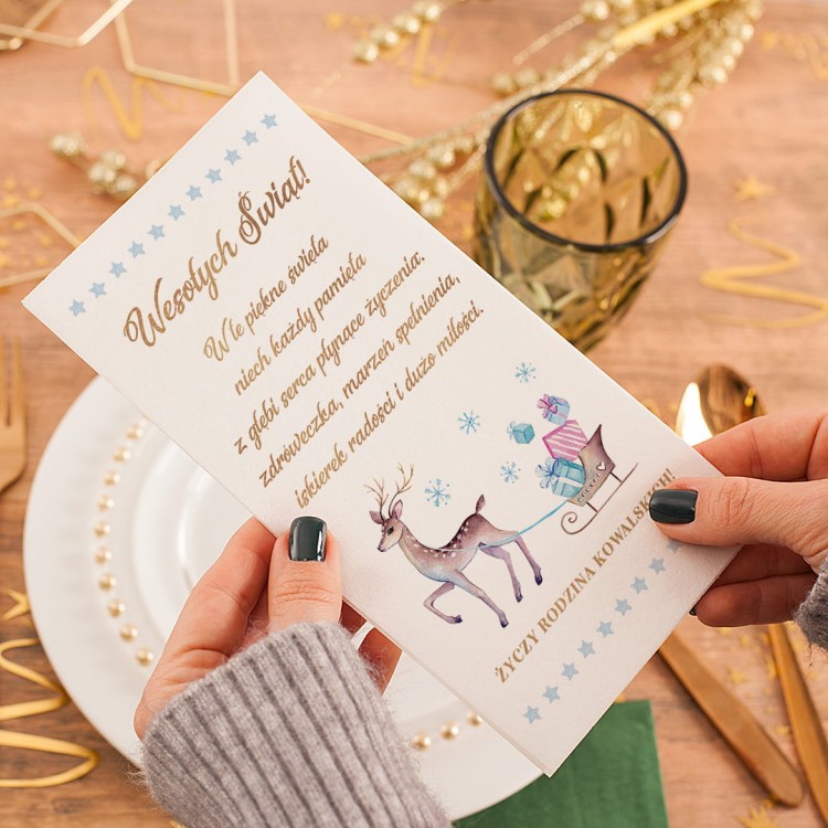 Opłatek świąteczny z reniferem, nadrukiem życzeń i podpisem rodzinnym.