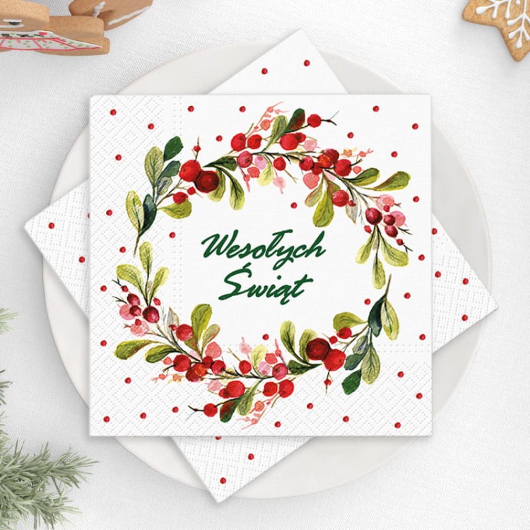 Świąteczny zestaw prezentowy z dekoracyjnymi serwetkami i słodyczami dla bliskiej osoby.