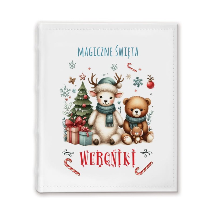 Biały album z postaciami świątecznymi i imieniem dziecka na okładce