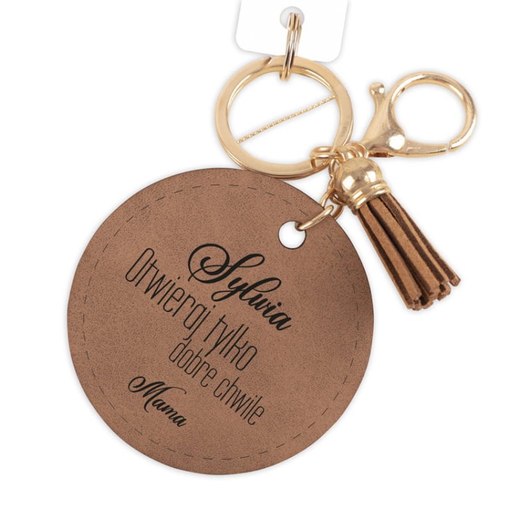 Elegancki skórzany brelok z cytatem motywacyjnym to praktyczny prezent.