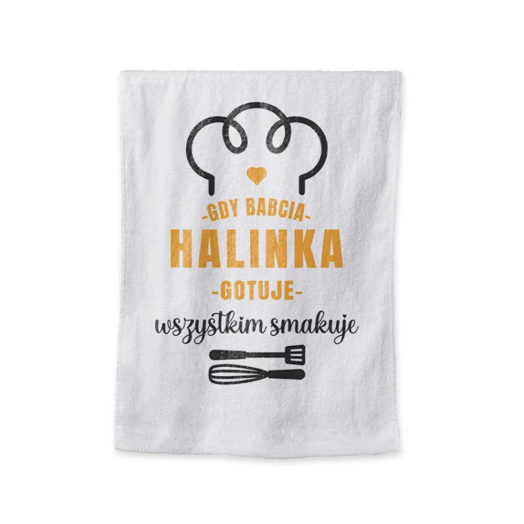 Personalizowany ręcznik z napisem „Gdy babcia gotuje – wszystkim smakuje”.