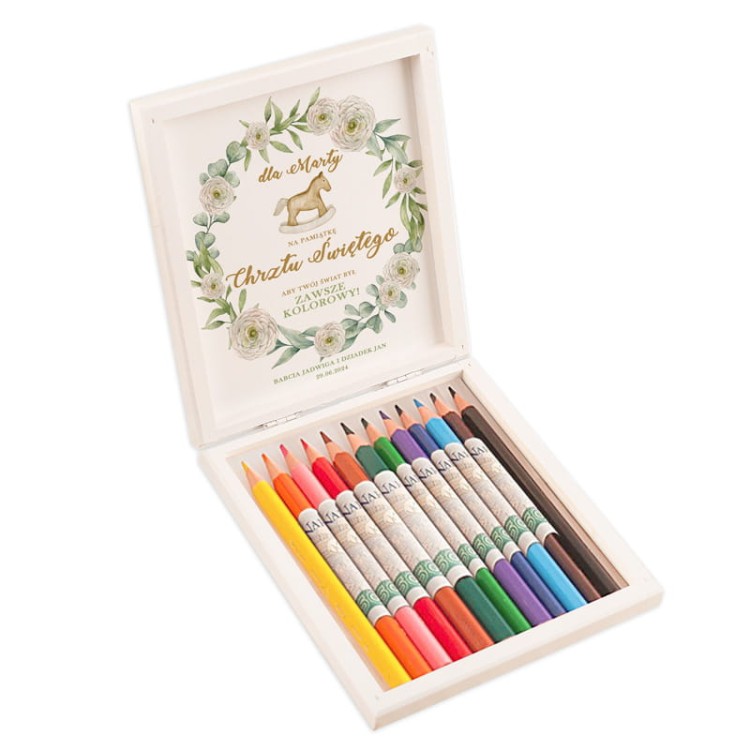 Kredki zaprezentowane jako kreatywny prezent pieniężny na chrzest.