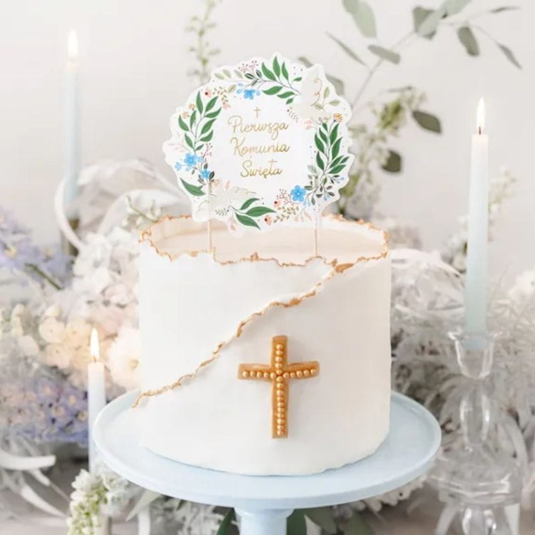 Topper na tort z napisem Pierwsza Komunia Święta i botaniczną dekoracją.