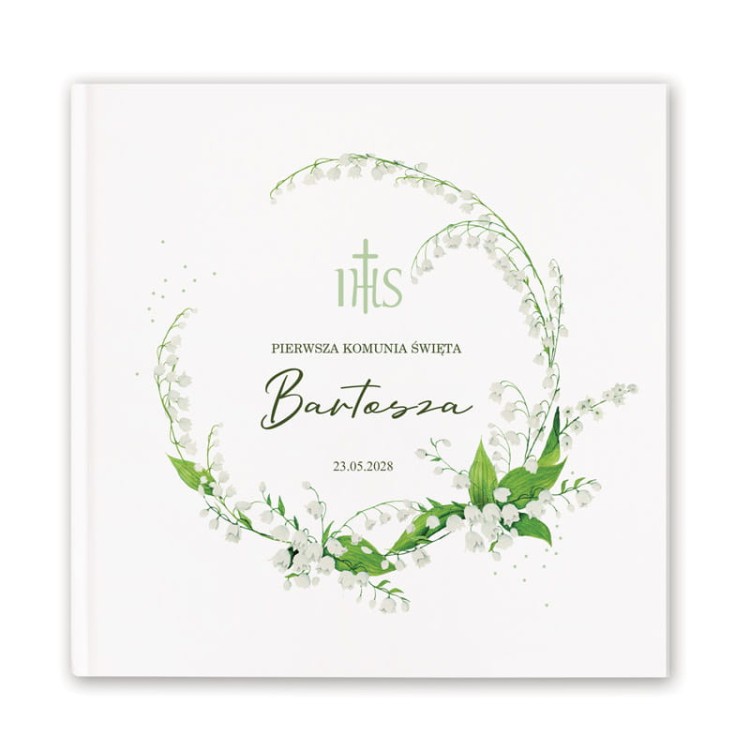 Personalizowana księga na komunię z motywem konwalii na okładce.