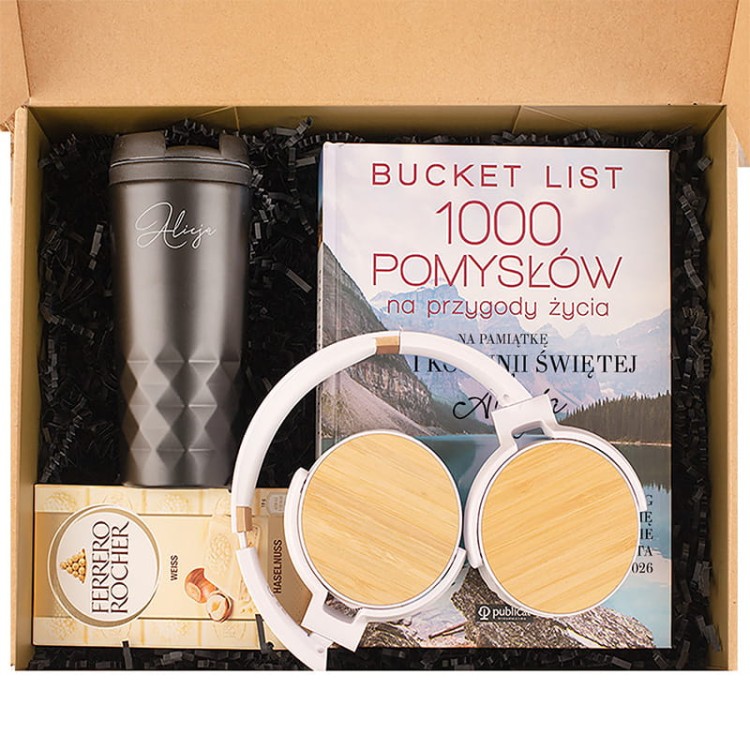 Personalizowany zestaw na Pierwszą Komunię ze słuchawkami i książką.