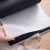 Album welurowy z czarnymi kartkami i szarą okładką.