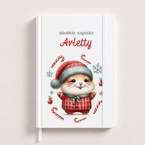 Świąteczny notatnik personalizowany z imieniem na okładce.