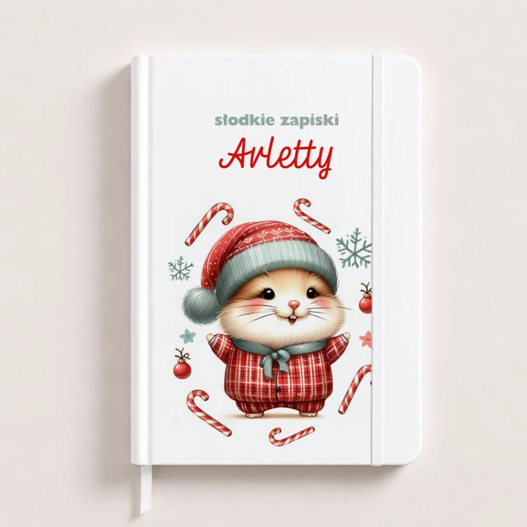 Świąteczny notatnik personalizowany z imieniem na okładce.