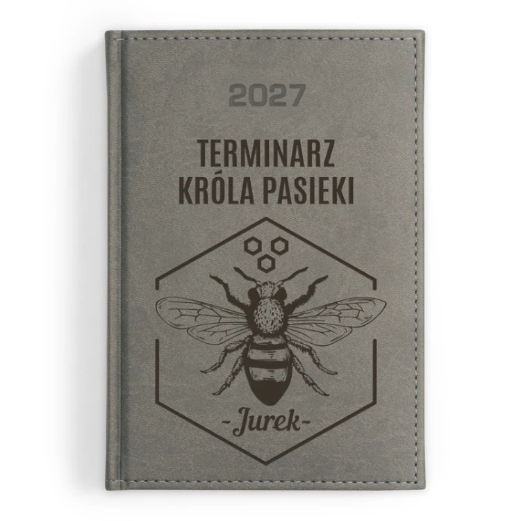Szary terminarz 2027 z napisem „Terminarz Króla Pasieki” i imieniem