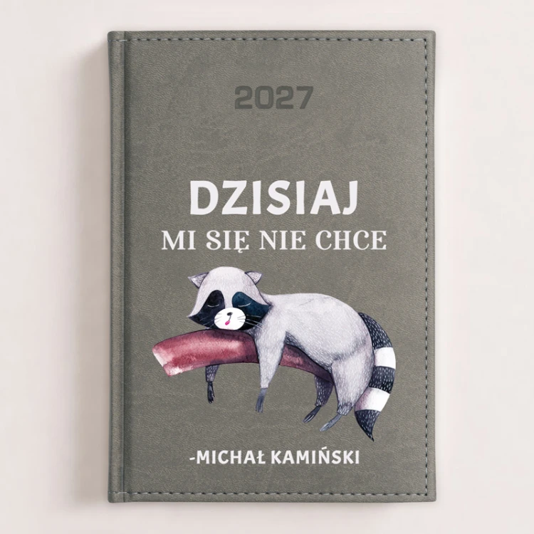 Personalizowany kalendarz książkowy 2027 z zabawnym napisem i grafiką leniwego szopa.