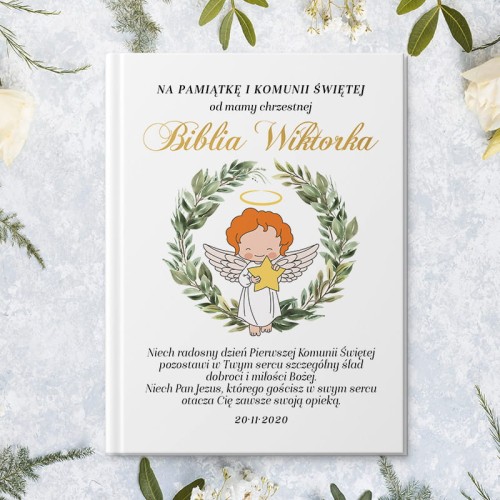 Biblia prezent na Komunię z imieniem dziecka.