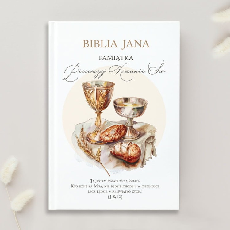 Personalizowana biblia na Pierwszą Komunię Świętą z imieniem dziecka i cytatem.