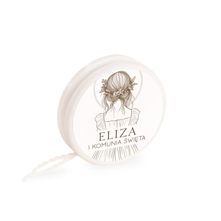 Jojo na komunię z imieniem dziecka i datą uroczystości na etykiecie.